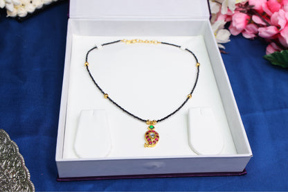 Elegant Mango Jadau Pendant with Black Beads