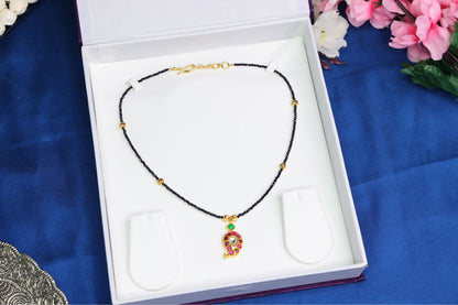 Elegant Mango Jadau Pendant with Black Beads