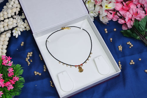 Gold Replica Lakshmi Pendant Short Black Beads Chain